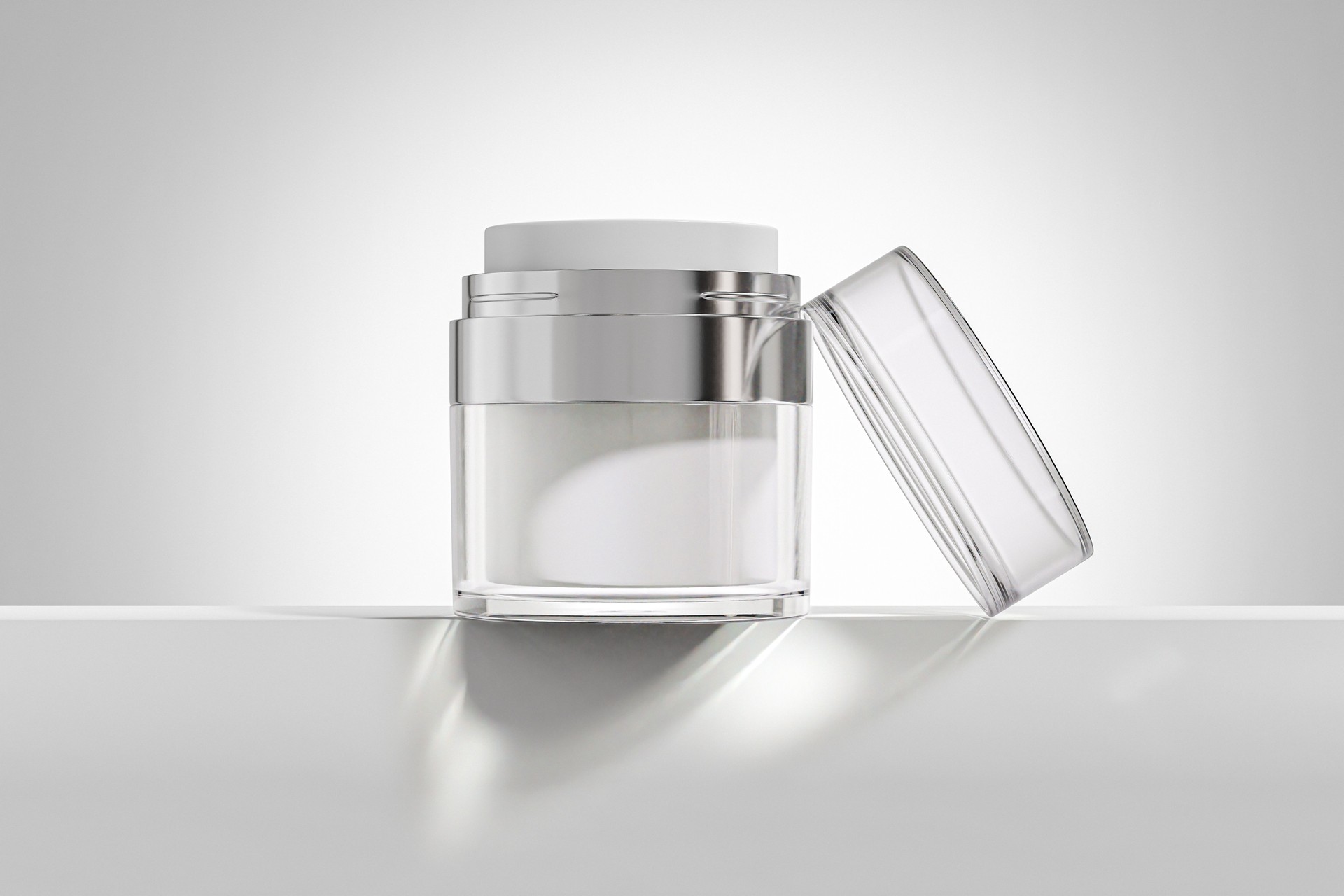 Airless cream jar mockup, anti-aging cream in vacuum bottle, luxury airless skincare packaging mockup, acrylic cosmetic jar with silver metallic texture, Double Walled refillable Cream container
